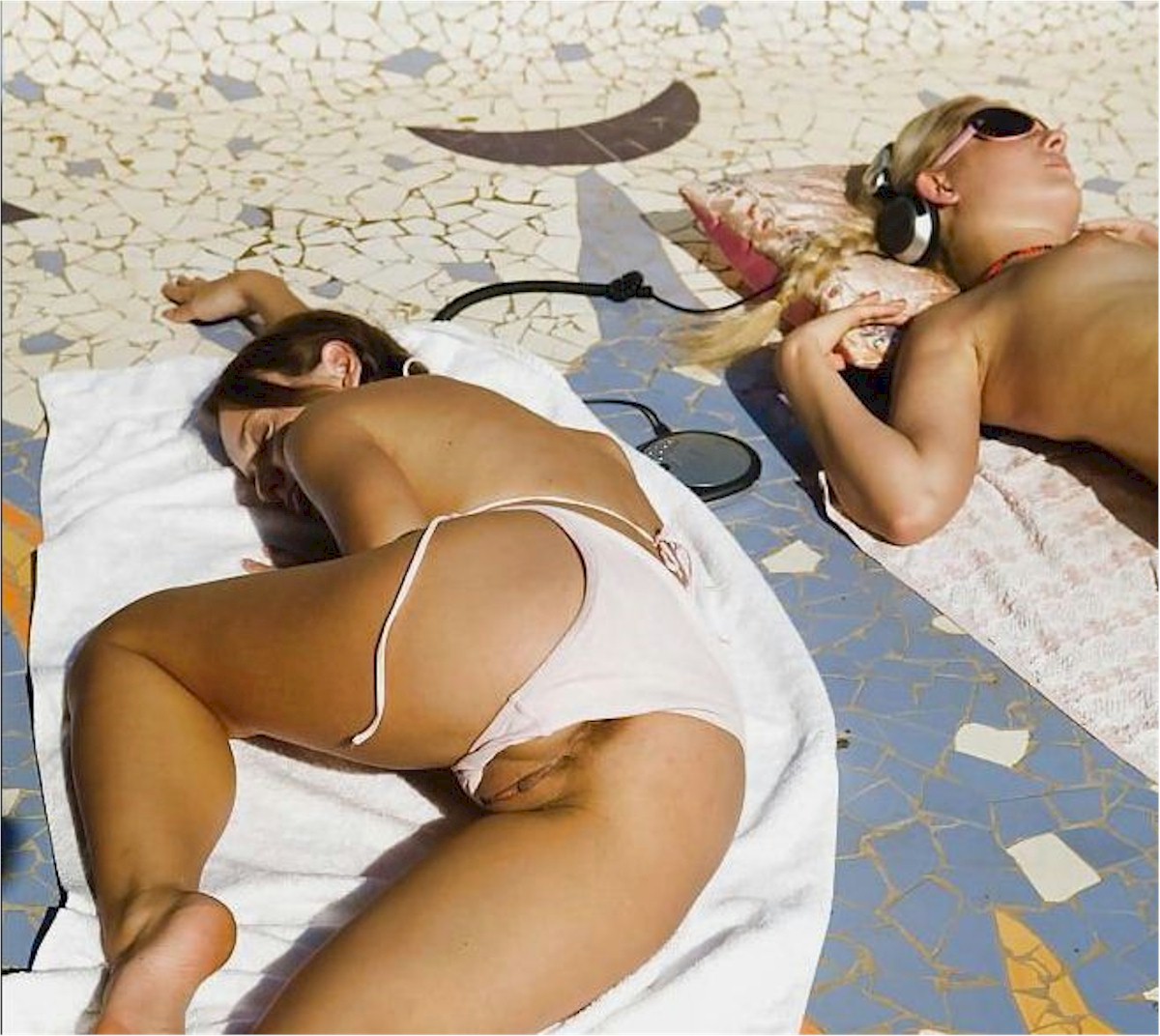 Bikini Pussy Slip On An Unsuspecting Sunbather At The Beach