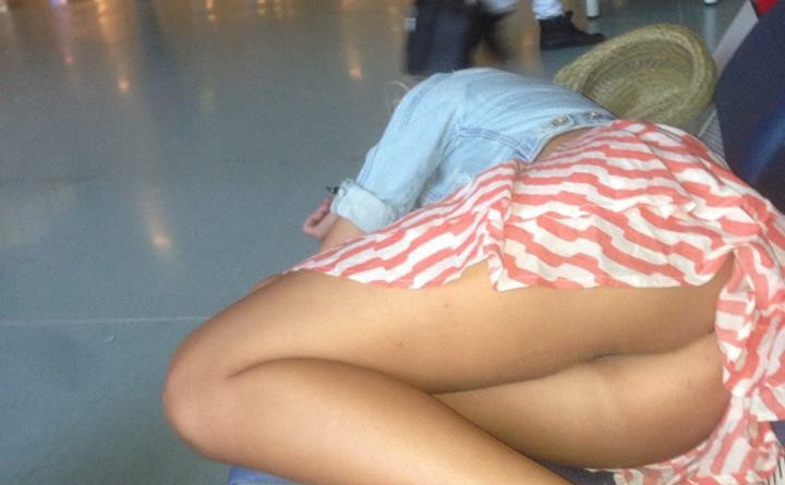 candid upskirt of a lady not wearing panties at the airport