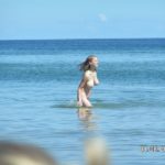 busty teen nudist taking a dip 01