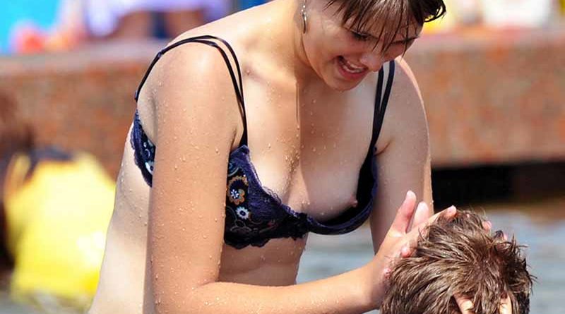 Bikini nipple slip spotted at a public pool. 